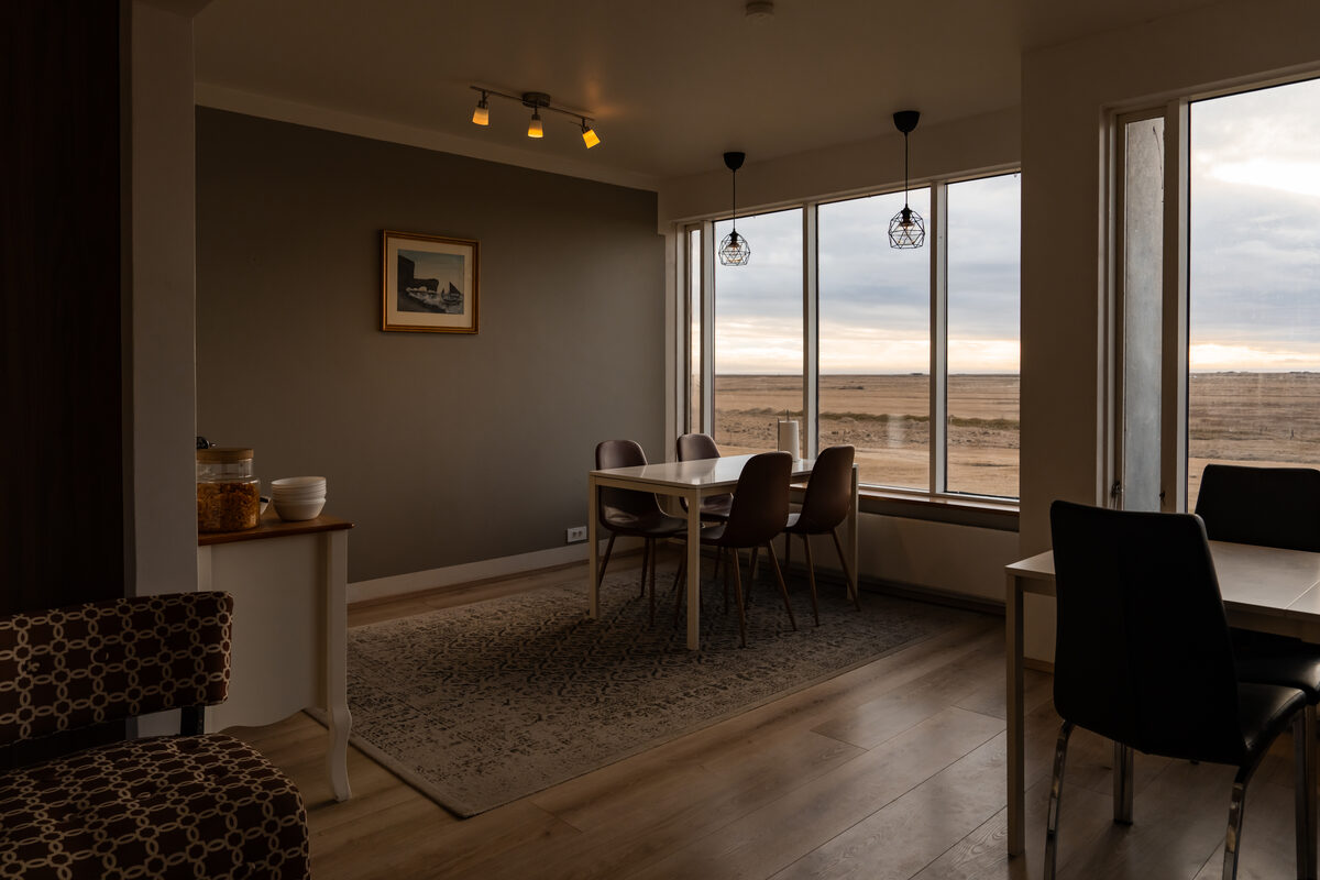 Dining area with pendant lights